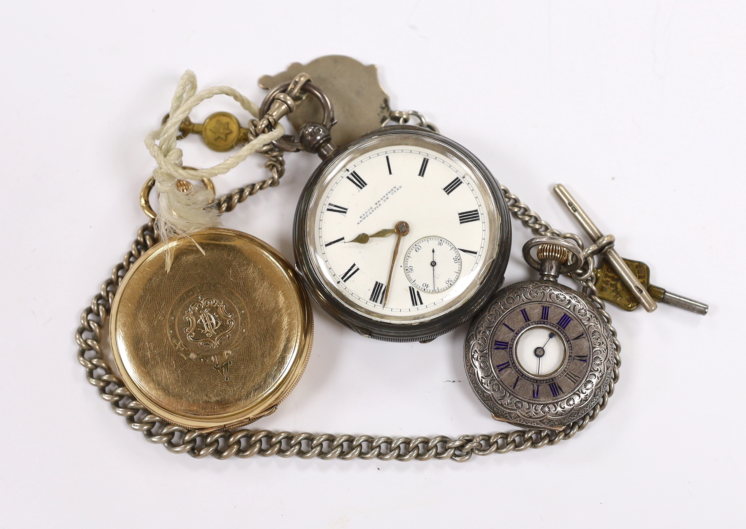 A George V silver open face keywind pocket watch by Ellis Branskey of Newcastle, on a graduated silver curb link albert, together with a gold plated Waltham hunter pocket watch and a Swiss 935 white metal half hunter fob